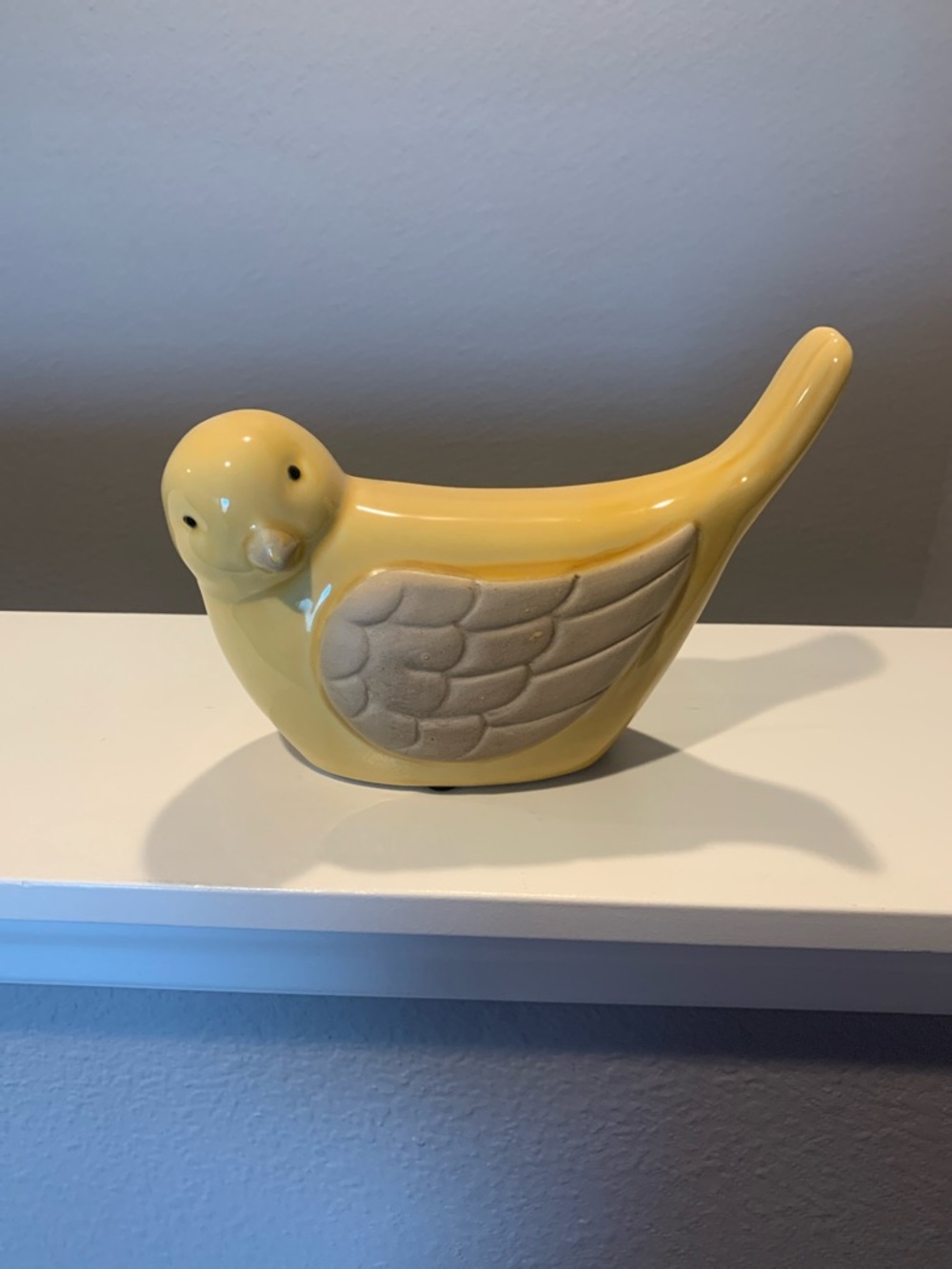 Kirklands Glossy Yellow Ceramic Bird with Cream Textured Wings